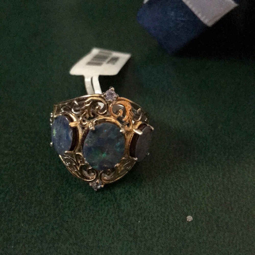 Gold and blue stone ring never worn